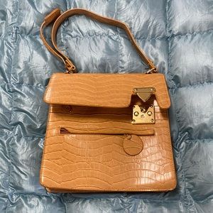 Beautiful NWOT Crocodile Embossed leather hand bag.  Retail $250